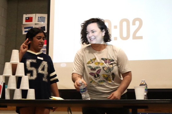 Picture of Counselor Tammy Berick playing the Bottle Flip Game