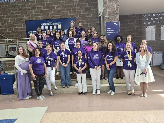 School staff posing for a picture
