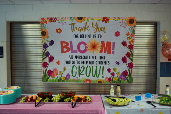 Banner thanking teachers that says "Thank you for helping us bloom! We appreciate all that you do to help our students grow!