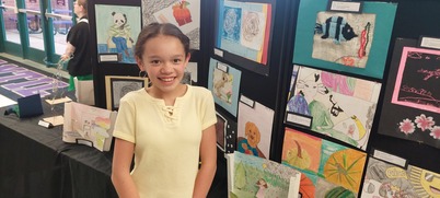 Student at art show