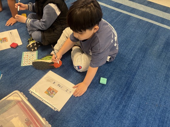 Student working on his writing 