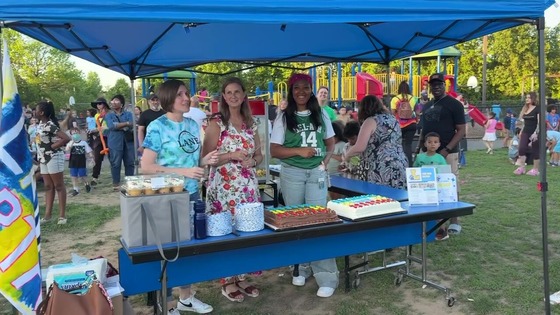 Three Lane principals singing happy birthday before cutting cake
