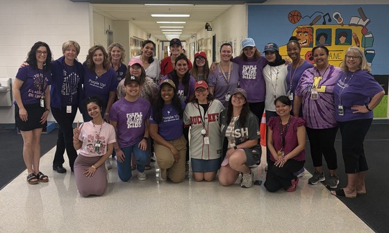 Lane staff members dressed in purple for Purple Up Day