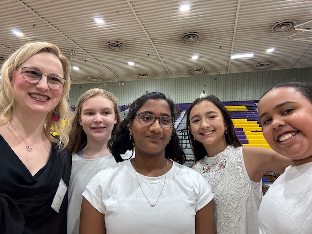 Ms. Shultz and four Cubbies who sang at the All County Chorus event.