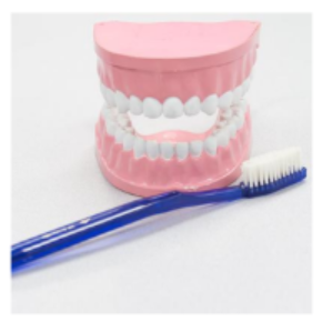 ABA Family Training - Teaching Self-Help and Independent Skills- picture of teeth and blue toothbrush