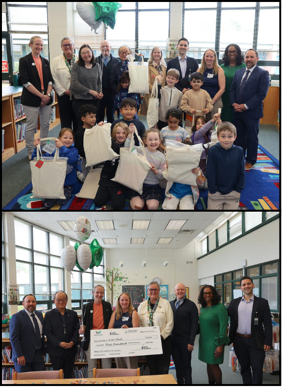 Students in the library showing off bags of books to borrow at the the Cares of the Quarter celebration