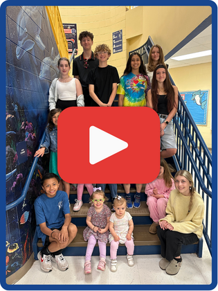 Image of children on the stairs for bring your child to work day