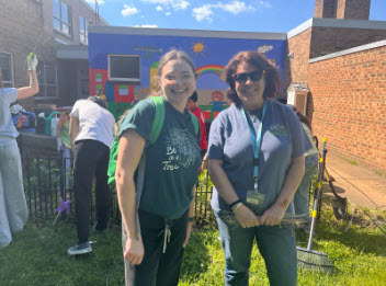 students gardening in school courtyard