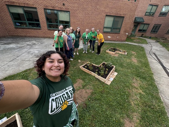 Staff planting on Earth Day