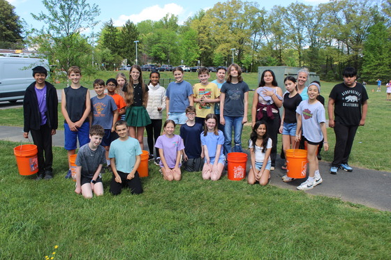 students posing for earth week event watershed activity