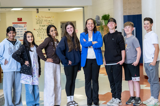 Principal with students