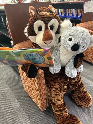 Terry and Stuffie Playing instrument