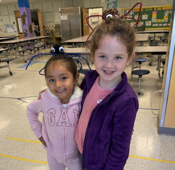 Two students pose for crazy hair day 