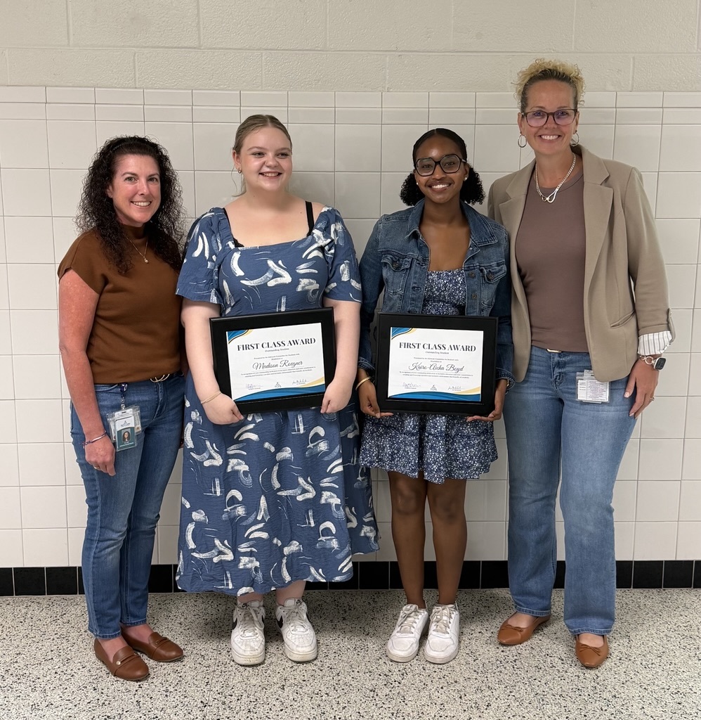 Students accepting an award with their faculty