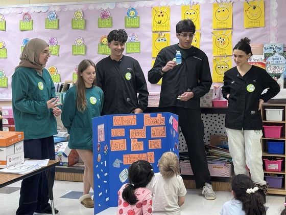 Dental Careers students present to Kindergarteners at Navy Elementary