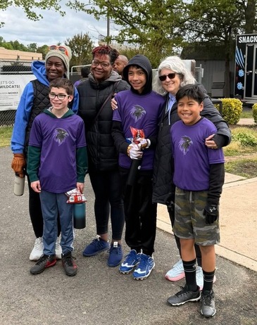Three teachers and three students after a football game