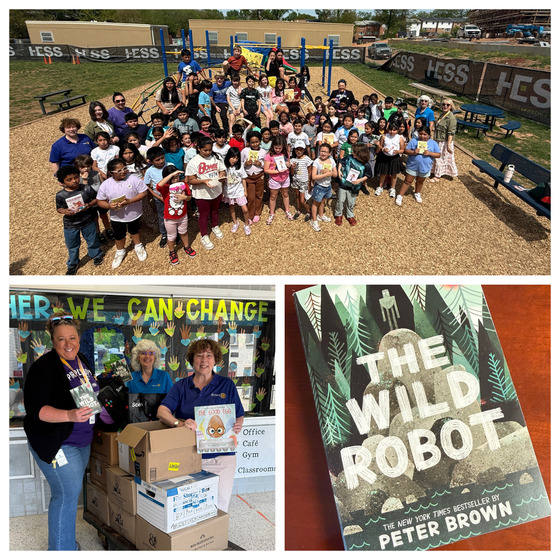3rd grade students receiving The Wild Robot from the Rotory Club