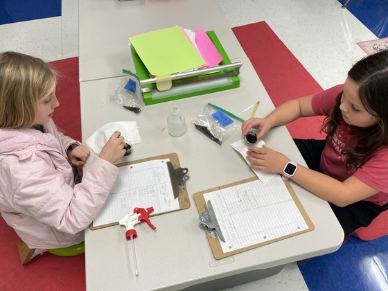 4th graders testing soil