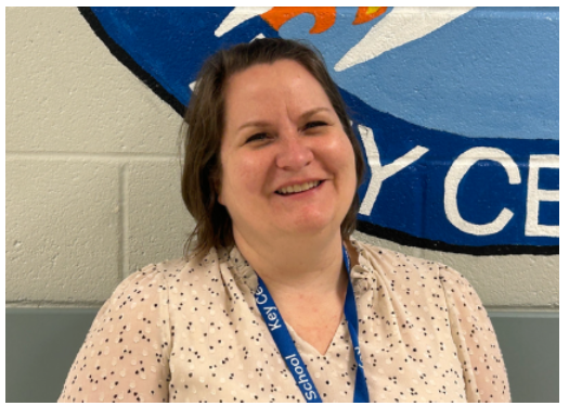 picture of school nurse in tan top, smiling.png