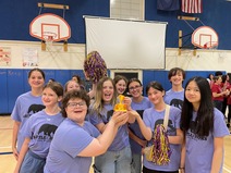 Lake Braddock Middle Schoolers holding their trophy 