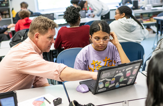 Mr. Hanrahan helping a student
