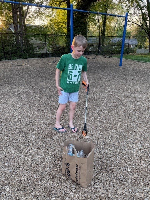 Picture of a Stenwood student picking up trash