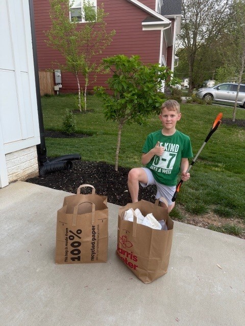 Picture of a Stenwood student picking up trash
