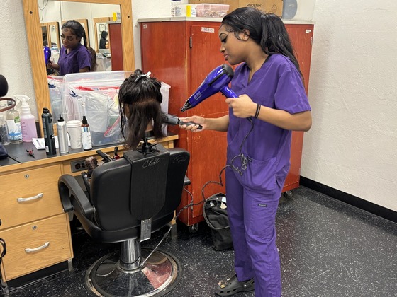 Cosmetology 2 student preparing for State Boards