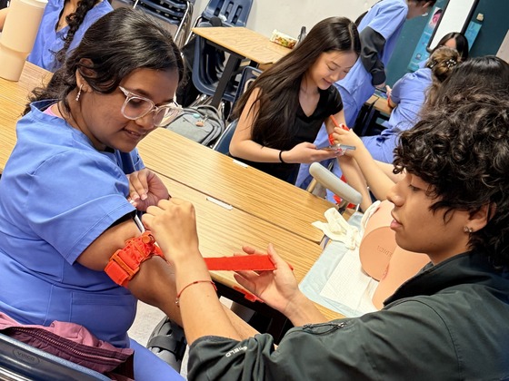 Medical Assistant students doing Stop the Bleed training