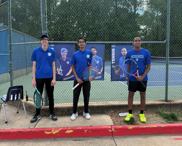 Tennis players posing for a picture