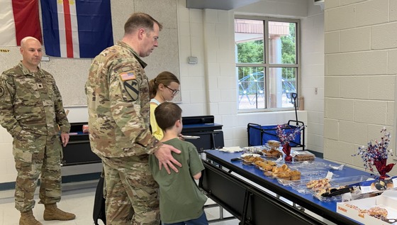 Military students and parents at our "Muffins with Military Lions" breakfast