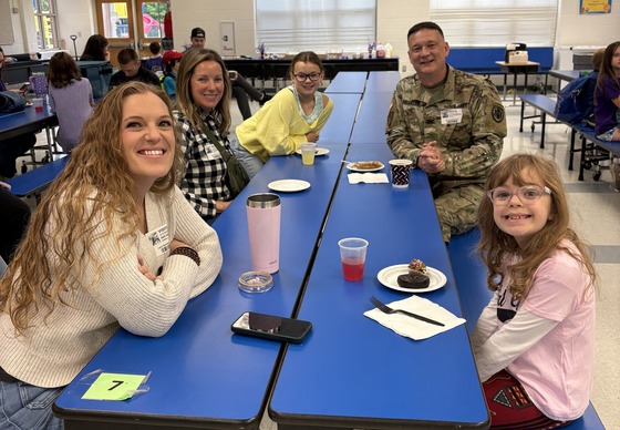 Military students and parents at our "Muffins with Military Lions" breakfast