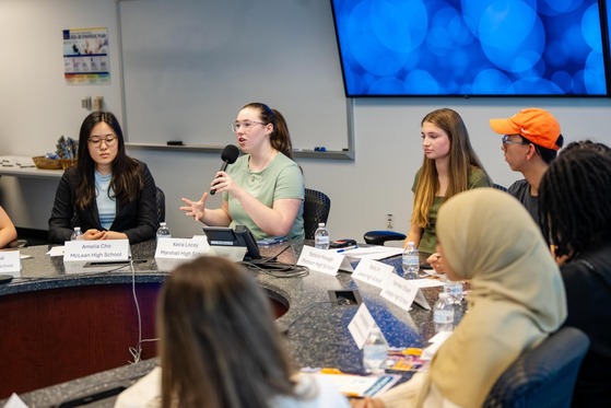 Students discussing the use of AI in Schools