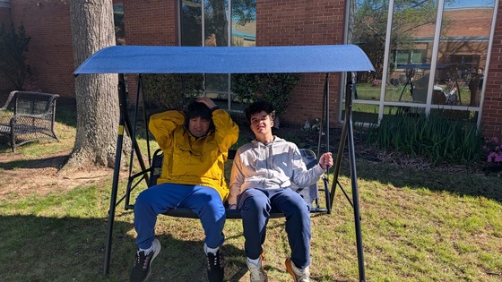 WSHS Students enjoying the new swing bench in the courtyard