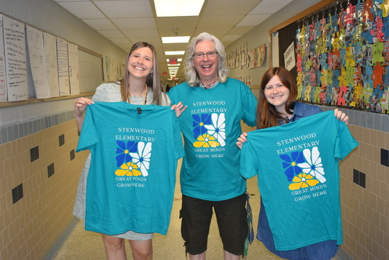 A picture of the 6th  grade team receiving their new Stenwood T-Shirts
