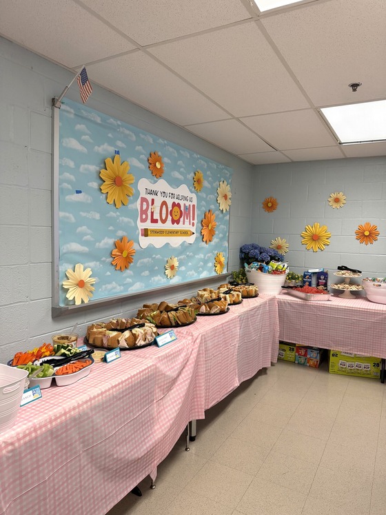 A picture of a PTA provided luncheon for Teacher Appreciation Week that included sandwiches from Wegman's