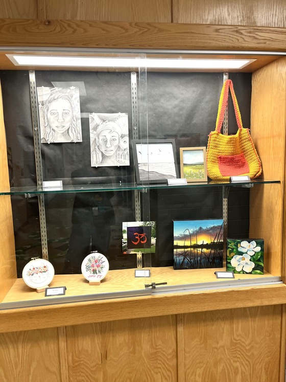 A picture of artwork created by staff members for the Staff Art Show
