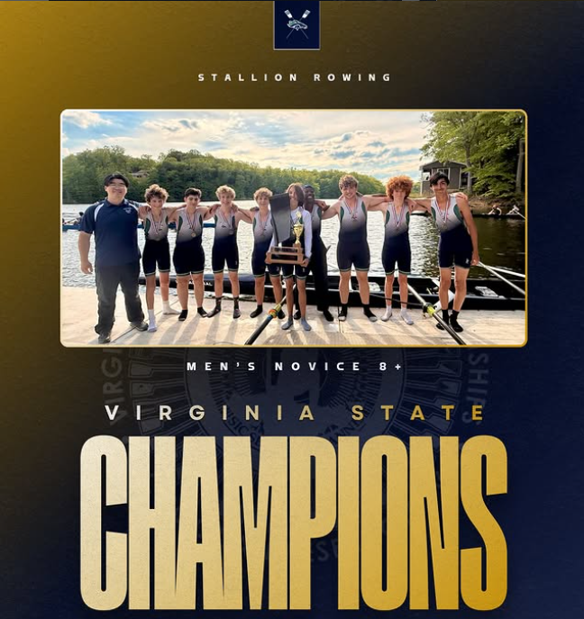 Students standing on dock together with trophy