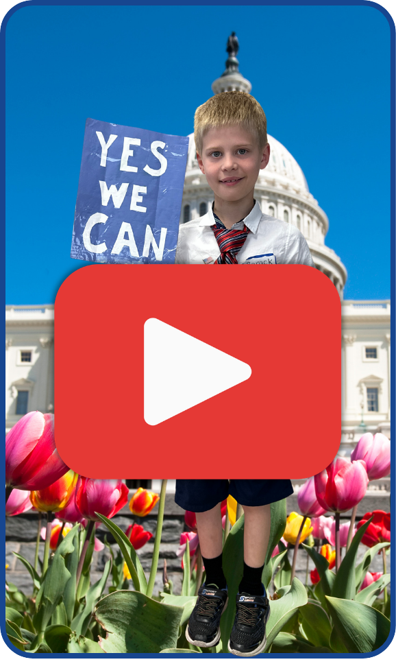 Image of student holding a sign that says Yes We Can with a red play button in the center