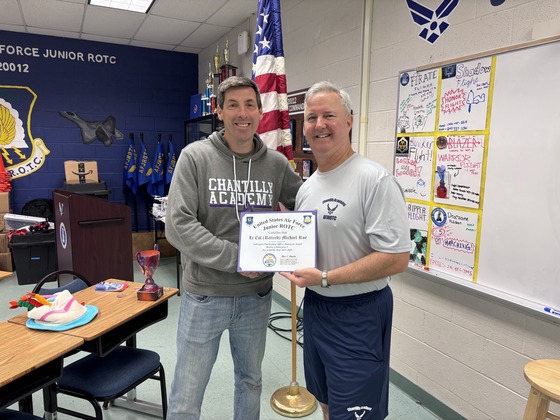 Lt. Col. Rue receiving his award