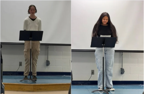 High school students presenting their poems on stage