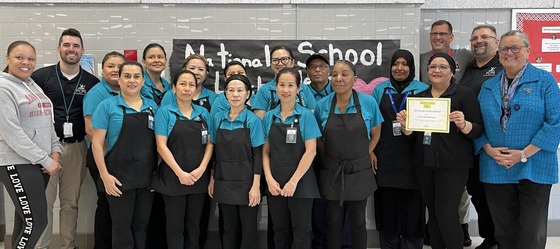 cafeteria staff with Dr. Reid