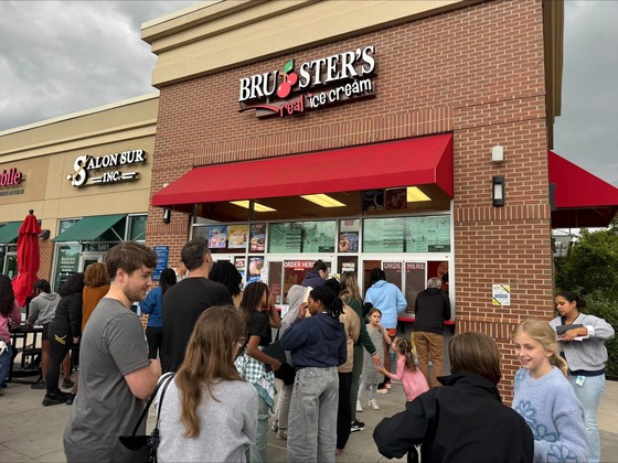 Crowd of Lane families and staff members in front of Bruster's Ice Cream in the Hilltop Centre
