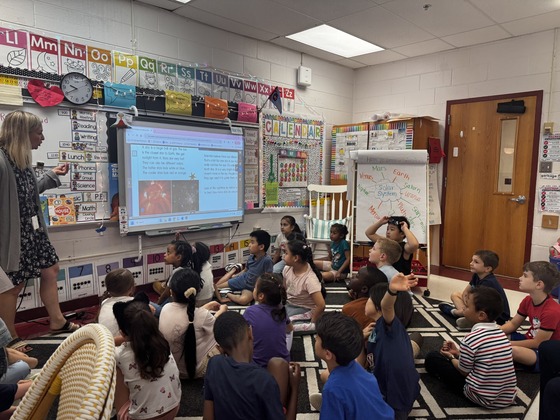 First grade class learning about space.