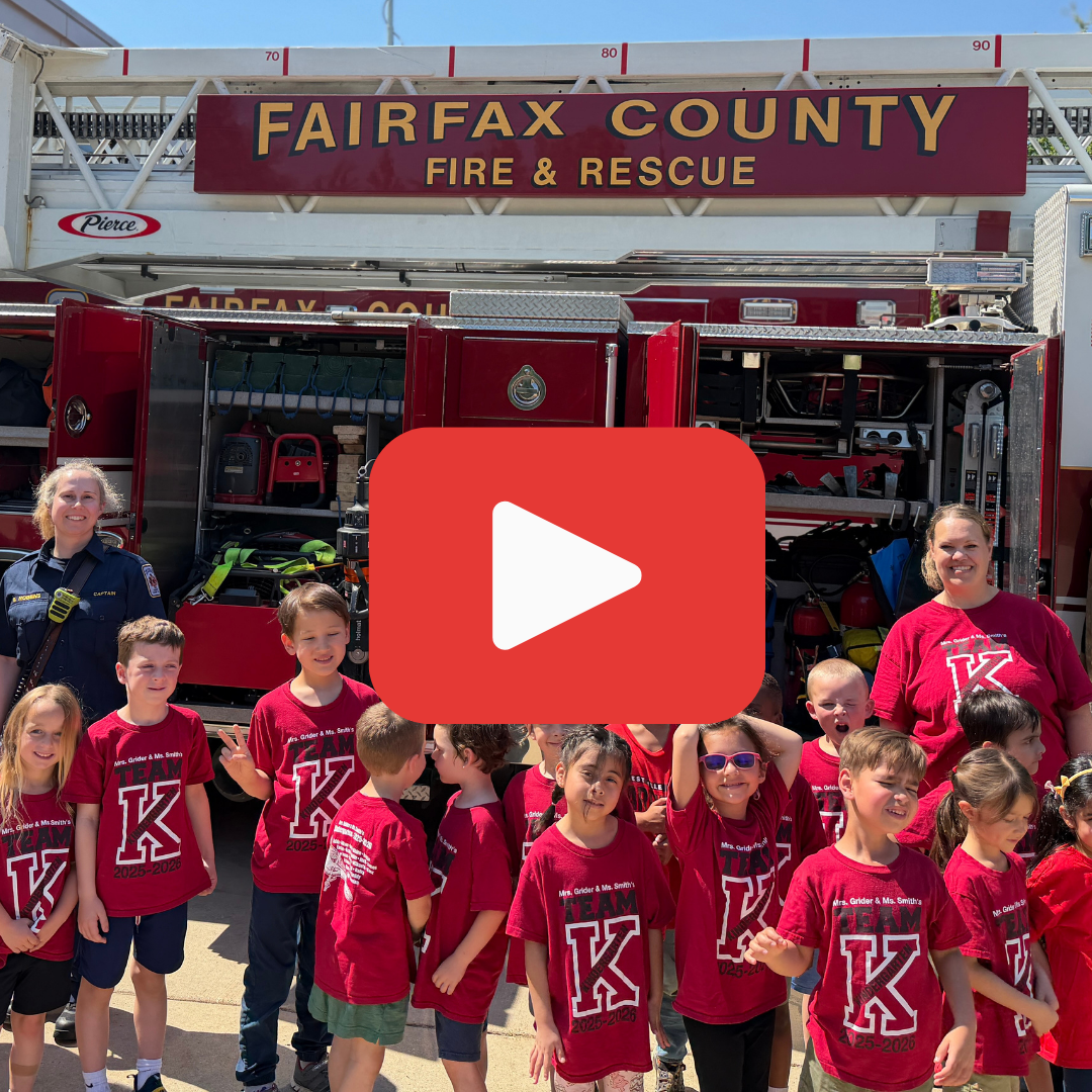 Kindergarten students and teachers standing in front of a Fairfax County fire truck