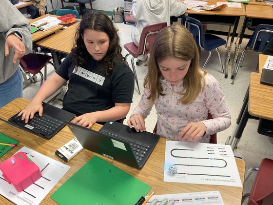 Students using Ozobots