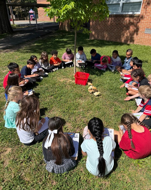 1st graders with chick