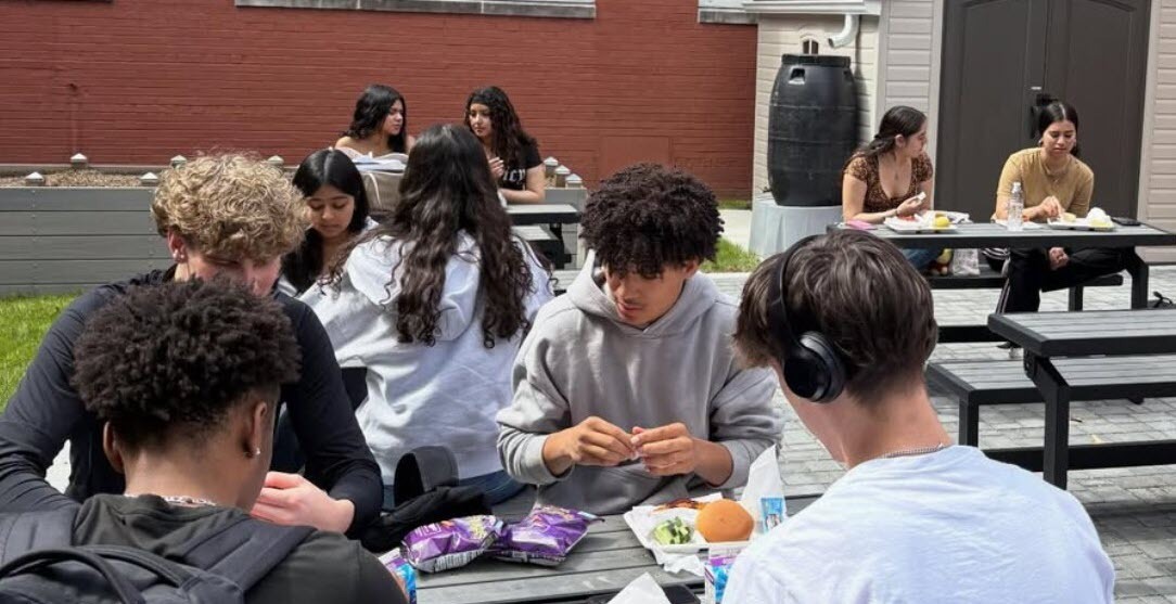 students at picnic tables