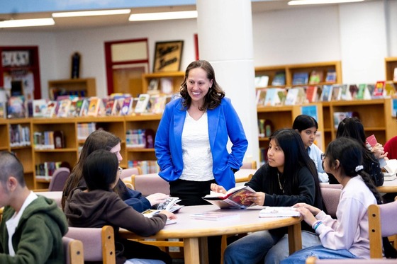 New Principal Tracy Bromberg greets students in the Liberty Middle School library