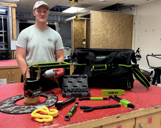 photo of student with tools from scholarship